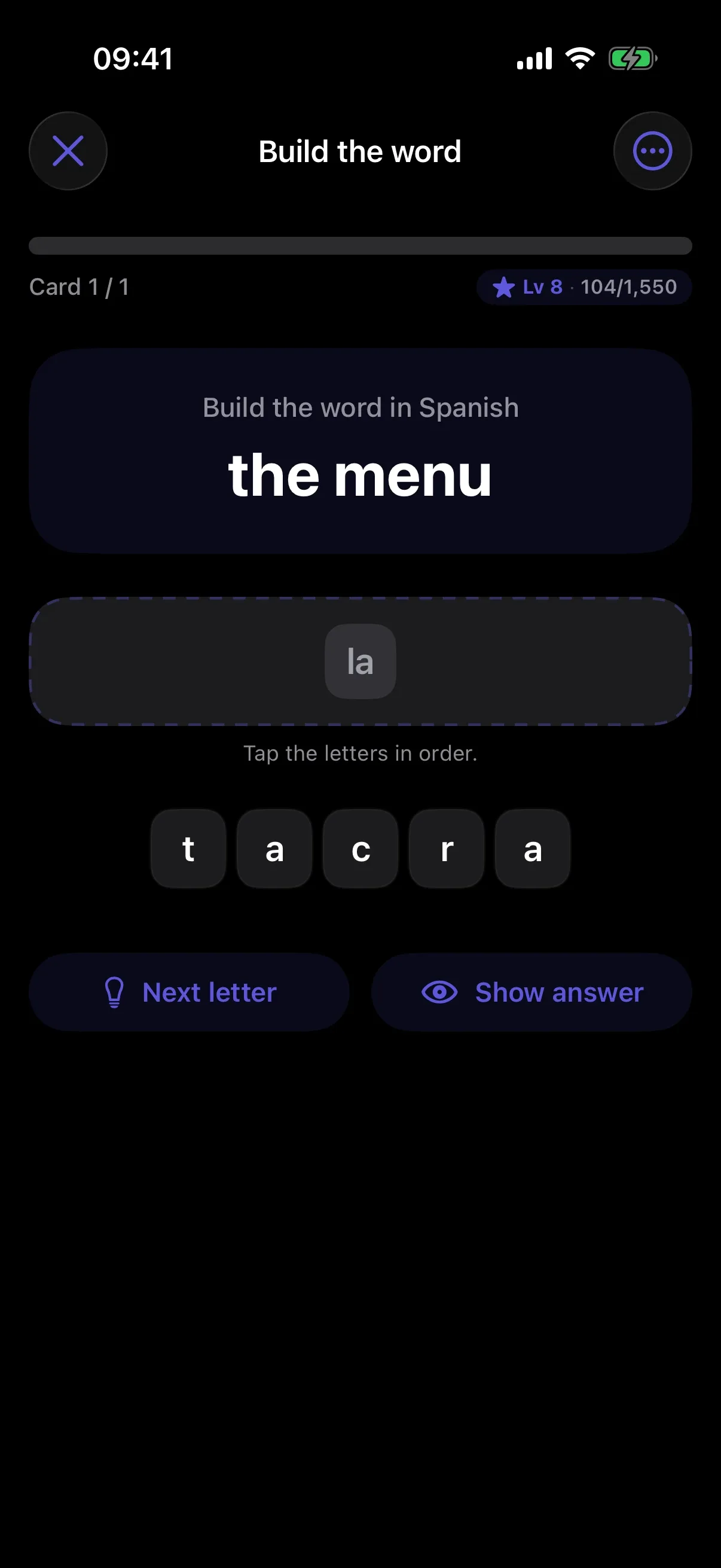 Build the word in Spanish, in dark mode
